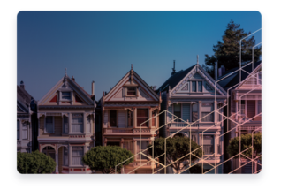 A row of Victorian style homes.